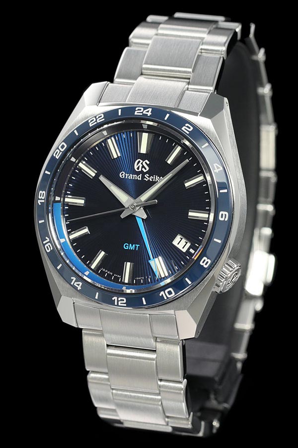 グランドセイコー SBGN021 GMTクォーツ メンズ腕時計,ステンレススティールケース,24時間表示のセラミックスベゼル,放射線ラインのライトブルーダイヤル,ステンレススチールのトリプルリンクバンド